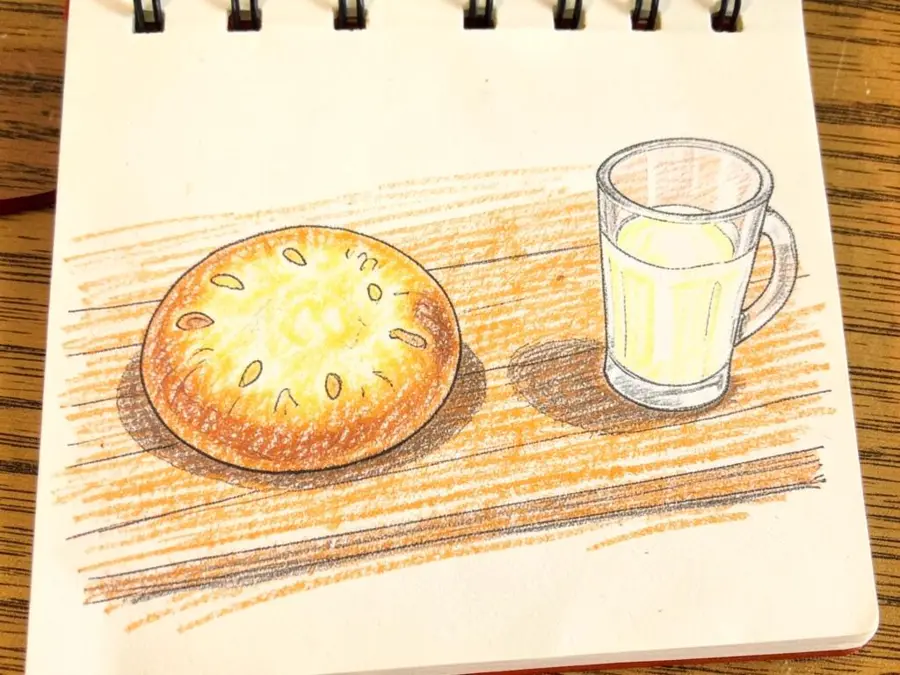 Schweizerdeutsch Wort Guetzli: gezeichneter Keks mit einem Glas Milch auf einem Holztisch